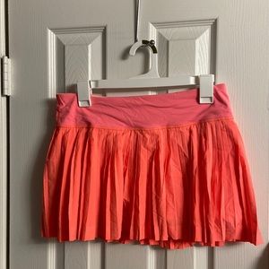 Lululemon Pleat to Street skirt — neon pink